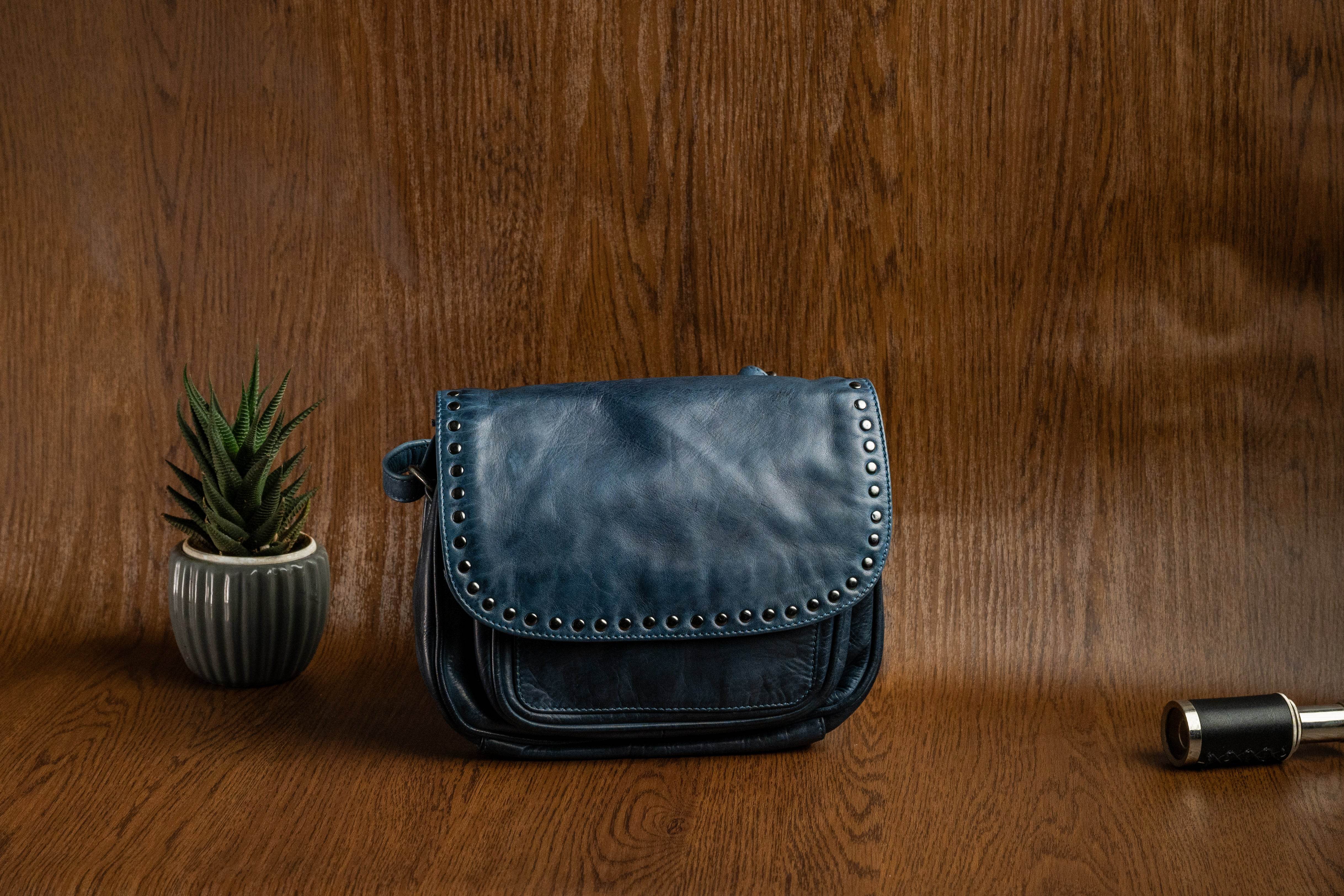 Ladies Compact Leather Sling Bag with Rivet Detail - Tom Tanners