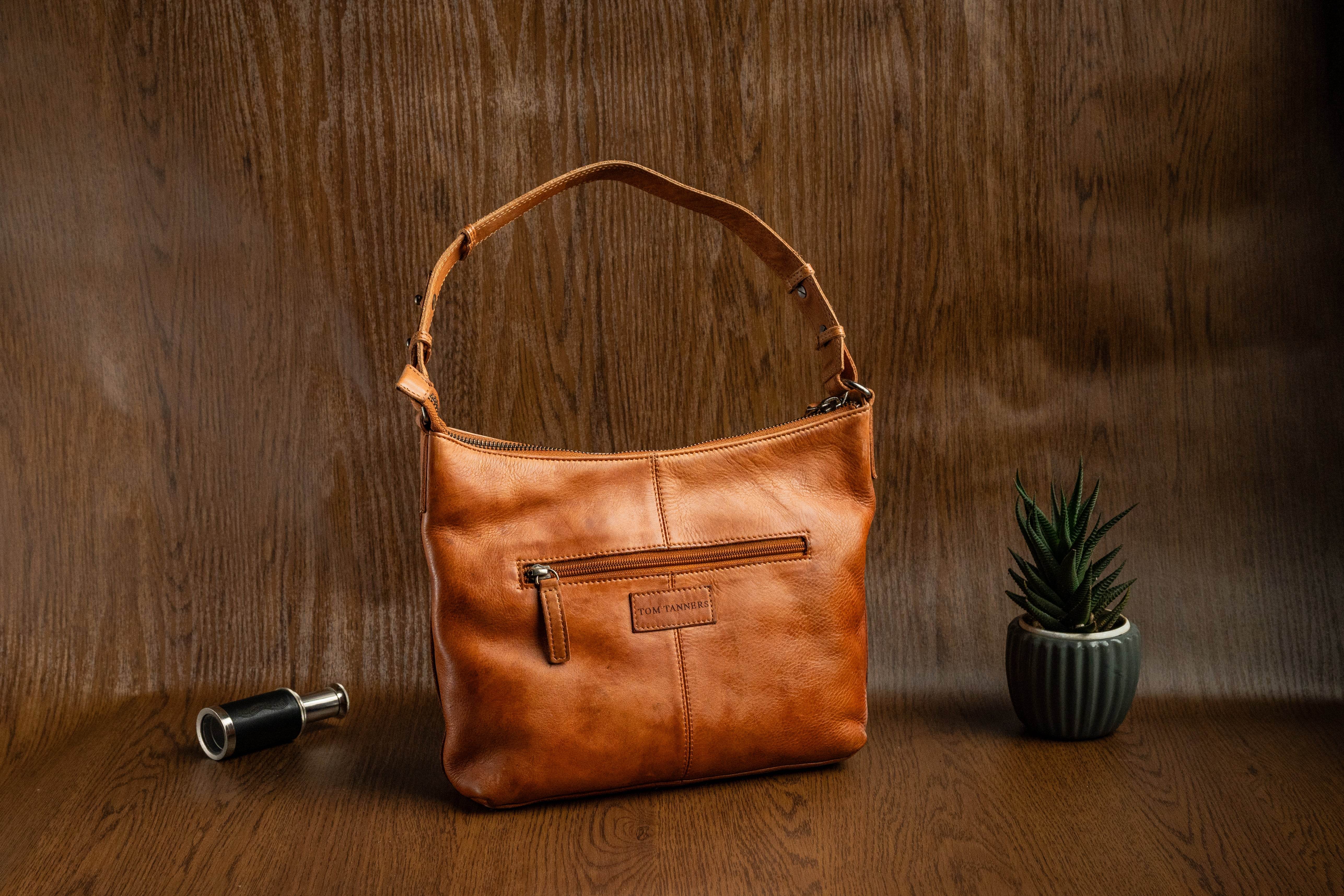 Ladies Raw Leather Sling Bag with Handwoven Front Panel - Tom Tanners
